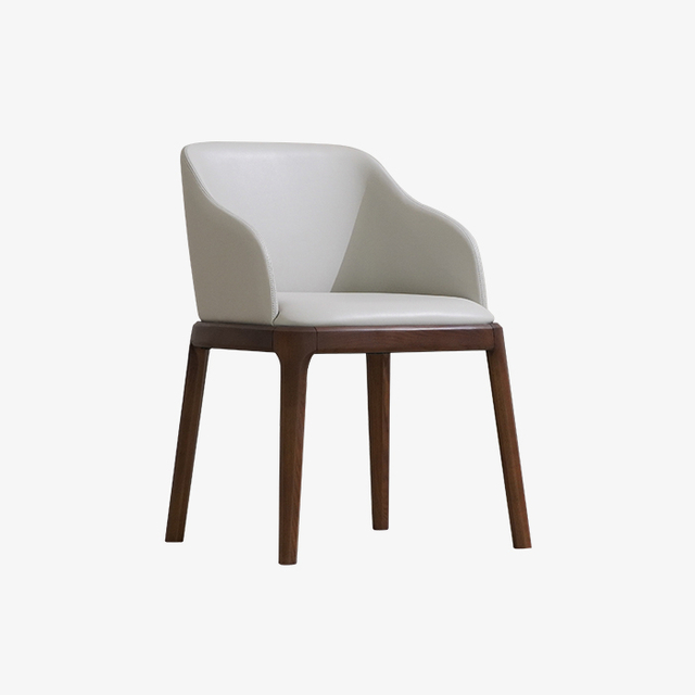 Sillón de comedor moderno tapizado en cuero blanco con patas de madera