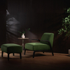 Sillón moderno de terciopelo verde con otomana