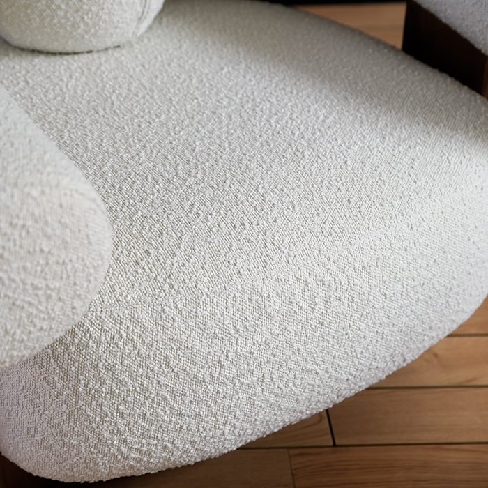 Sillón moderno tapizado en polar Teddy con otomana 