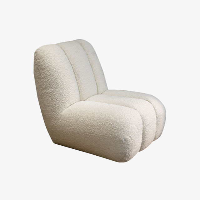 Sillón minimalista con sofá individual y suelo Boucle